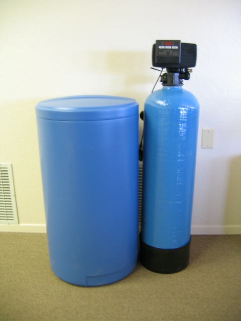 Water softener with brine tank