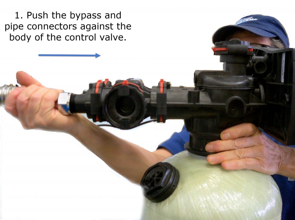 push the bypass and pipe connectors against the body of the control valve